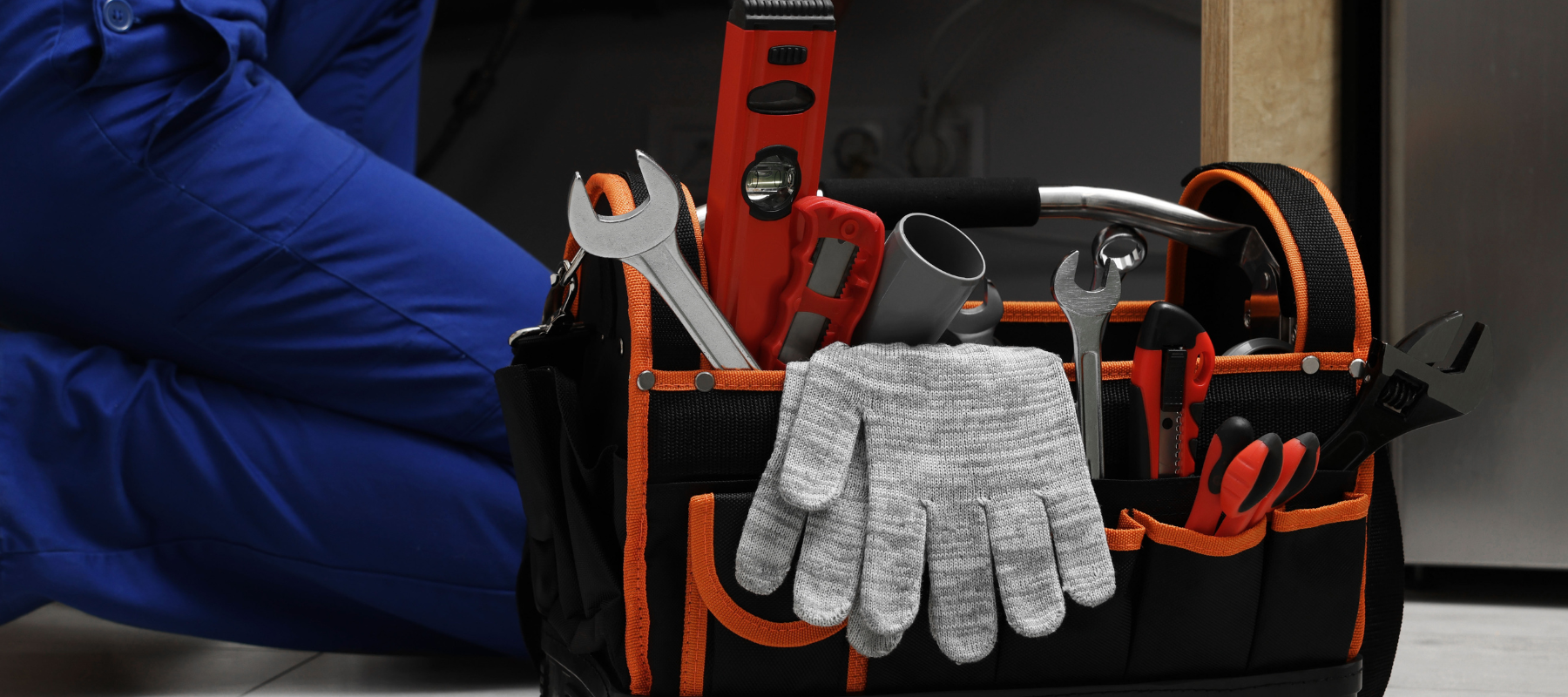 A close-up of a tool bag filled with tools.