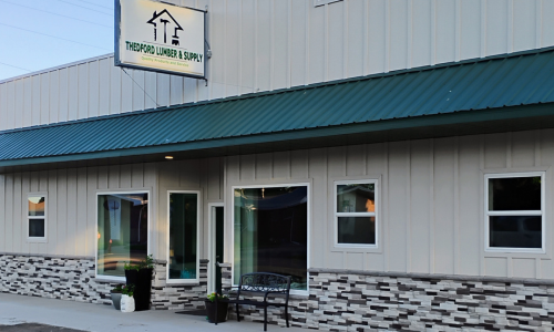Thedford Lumber store front on a clear day.